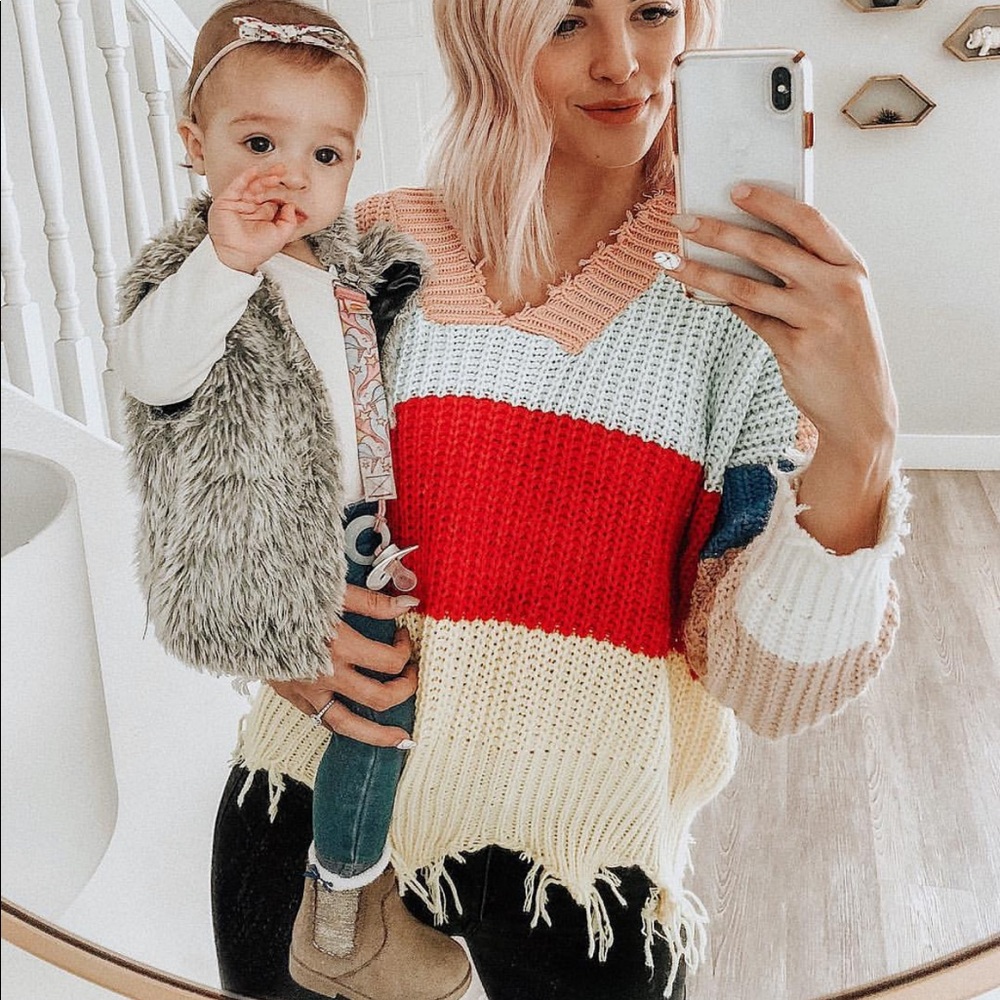Distressed color block sweater